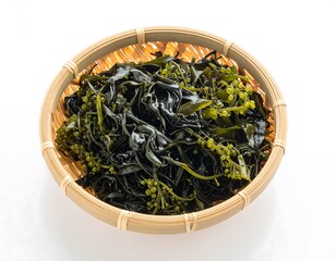 Dried seaweed in a bamboo colander
