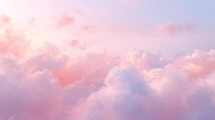 Soft pink and purple clouds illuminated by the gentle glow of sunrise or sunset.