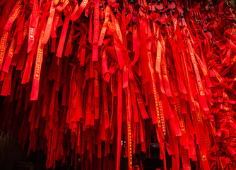 Red ribbons or strings used as blessing in buddhism