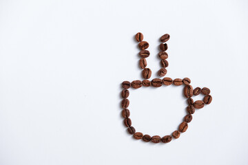 Cup of coffee icon from beans isolated on white background