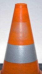 Orange traffic cone with reflective band
