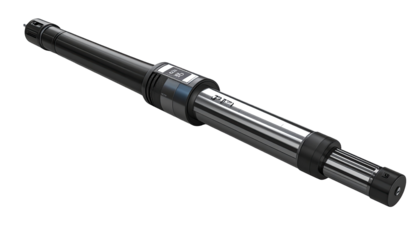 Long, metallic machine part with precision features