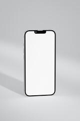 Smartphone Mockup with Blank White Screen, modern mobile phone template on a clean grey background for product display.
