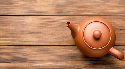 Rustic Brown Teapot On Weathered Wood