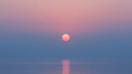 A sky of blue and pink. A seaside at sunrise. Early morning. Sunrise. The shore.