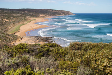 Rolling waves on a remote sandy beach in South Australia