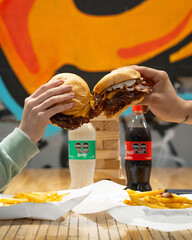 man holding a bowl of fish