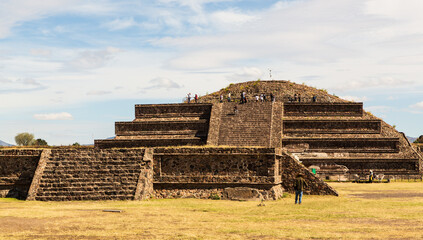 Teotihuacan, Mexico - 1 December 2022: Tourists and pyramid of the Sun of Teotihuacan