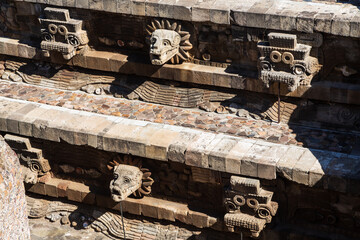 Teotihuacan, Mexico - 1 December 2022: Decorations and stone carvings of pyramids of Teotihuacan 
