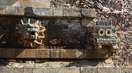 Teotihuacan, Mexico - 1 December 2022: Decorations and stone carvings of pyramids of Teotihuacan 