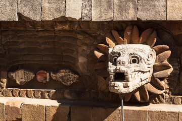 Teotihuacan, Mexico - 1 December 2022: Decorations and stone carvings of pyramids of Teotihuacan 
