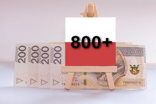 Inscription 800 plus next to 200 Polish zloty banknotes. 800 plus is evaluation of the 500 plus program in Poland, state program in the field of social policy, 