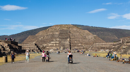 Teotihuacan, Mexico - 1 December 2022: Tourists and pyramid of the Sun of Teotihuacan