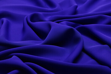 Obraz premium Close-up of royal blue, delicate, lightweight georgette fabric, showcasing its soft, flowy texture and subtle drape, perfect for fashion, textiles, and design projects.