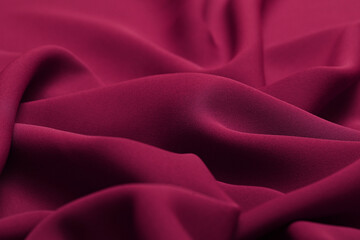 Obraz premium Close-up of fuchsia color, delicate, lightweight georgette fabric, showcasing its soft, flowy texture and subtle drape, perfect for fashion, textiles, and design projects.