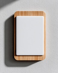 Blank white square plaque on light brown wooden frame