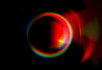 Abstract colorful background with bright circular light pattern and glowing blue fractal energy