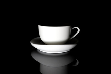 cup saucer black background minimalistic coffee tea drink beverage monochrome dark espresso simple
