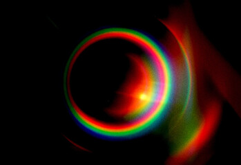 Abstract colorful background with bright circular light pattern and glowing blue fractal energy