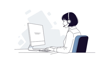 Person wearing headset works at computer in office.