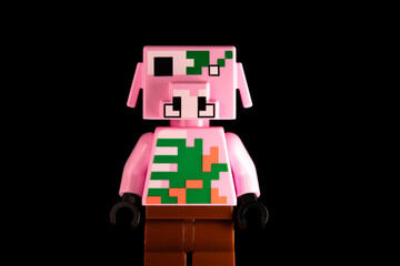 Obraz premium LEGO Minecraft Zombie Piglin on a black background