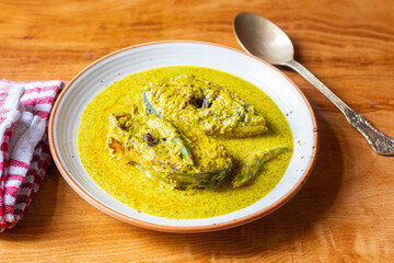 Traditional Bengali Hilsa Curry with Mustard Seeds, Aromatic Spices, Rich Flavors, Authentic Taste,...