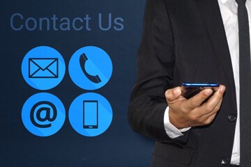 Businessman hand use smart phone  or tablet  with modern email icon, CONTACT US (Customer Support Hotline people CONNECT ) Call Customer Support