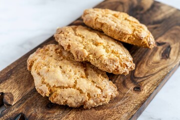 Perrunillas are a type of traditional sweet pastry, typical of several Spanish towns. Main ingredients, lard, egg, flour, sugar, oil, cinnamon, lemon, almonds and brandy.