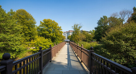 Urban Park Pathway with Benches, Trees, and Paved Tiles on a Clear Day