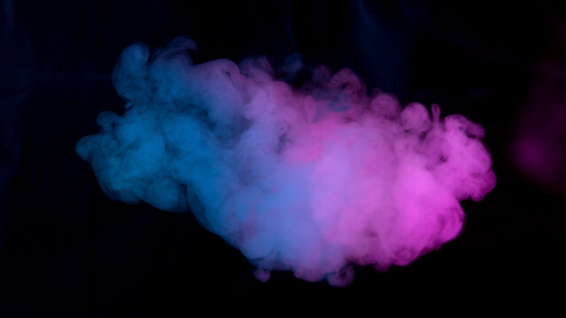 Atmospheric smoke, abstract neon color background, close-up.