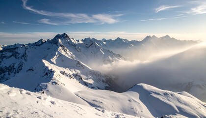 Snowy Mountain Peaks in Sunlight.