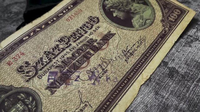 Ancient hungarian pengo vintage 1945 budapest 100 pengo banknote represents rare historical hungarian currency.