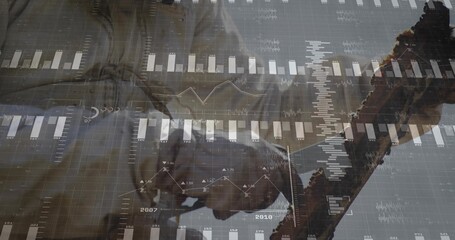 Showing handshake between partners in suits on digital dashboard, with bar charts line graphs grid