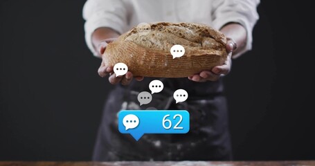 Holding artisanal loaf, baker wearing apron in bakery, displaying chat bubbles and comment count 62