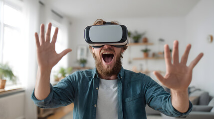 Naklejka premium Excited man wearing virtual reality headset, experiencing immersive technology in modern living room