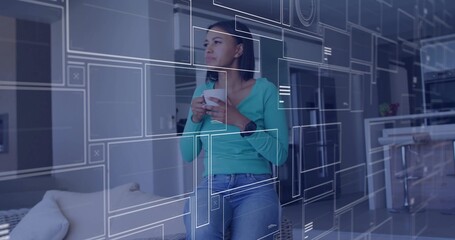 Leaning mid-adult woman holding white ceramic mug near window in open-plan home, with UI overlays