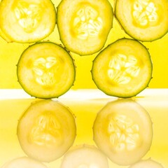Stacked cucumber slices, vibrant yellow