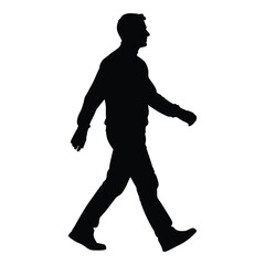 A man walking forward in a stark black silhouette