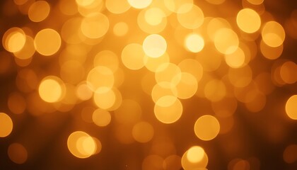Fototapeta premium Warm golden bokeh lights create a soft blurred abstract background