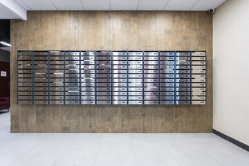 mailboxes in the lobby of an apartment building