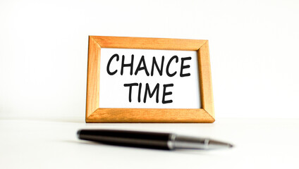 Chance time symbol. Concept word Chance time on beautiful wooden picture frame. Black pen....