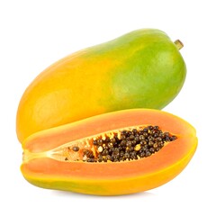 Fresh papaya fruit, whole and halved, isolated on white