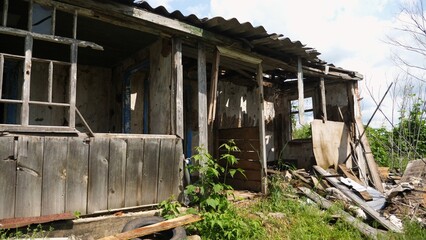 View to destroyed residential buildings at Kharkivska oblast. Ruined houses after bomb attacks on ukrainian territory from russia army. Consequences of russian invasion of Ukraine. Slow motion