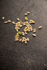 Seed mix sunflower seeds and pumpkin seeds natural product tasty snack fresh delicious gourmet food background on the table rustic top view copy space keto and paleo diet vegan and vegan food