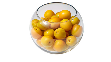 Fresh ripe yellow cherry tomatoes filling a clear glass bowl isolated on transparent background