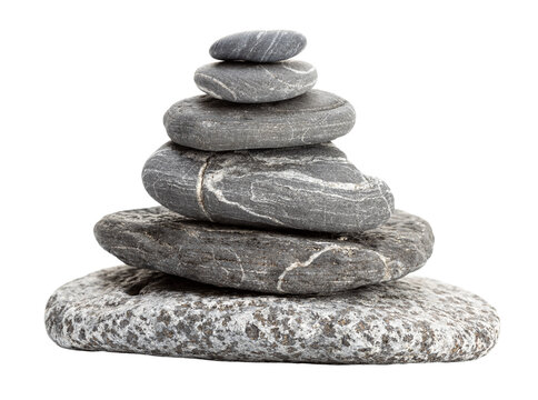 Smooth gray pebbles stacked in a pyramid shape cut out