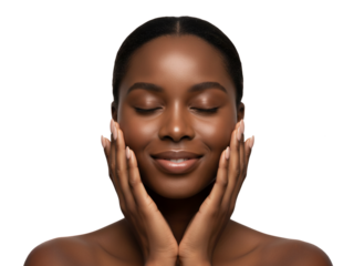 Woman with radiant skin smiling peacefully, eyes closed, gently touching her face with both hands