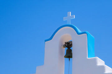 Traditional church top with cross and bell
