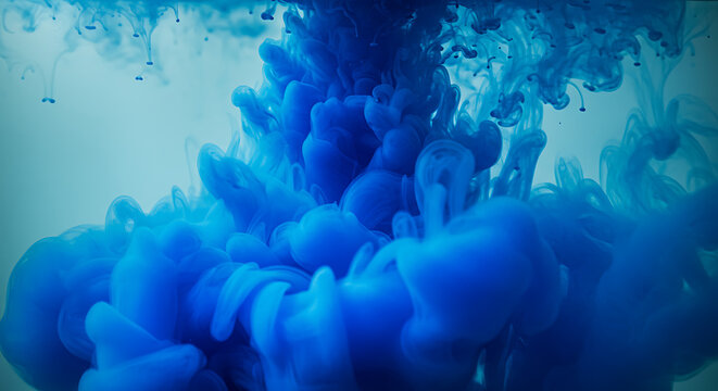 Abstract blue ink cloud swirling in water