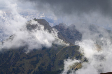 Low clouds over Dolomites mountains